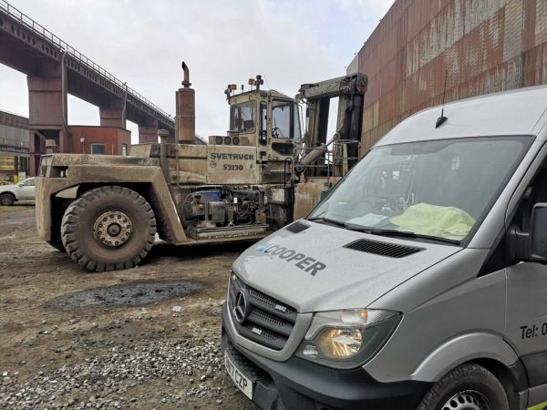Image of a Cooper Handling Service Van and a 32 - 80 Tonne Svetruck Forklift Ready for Repair